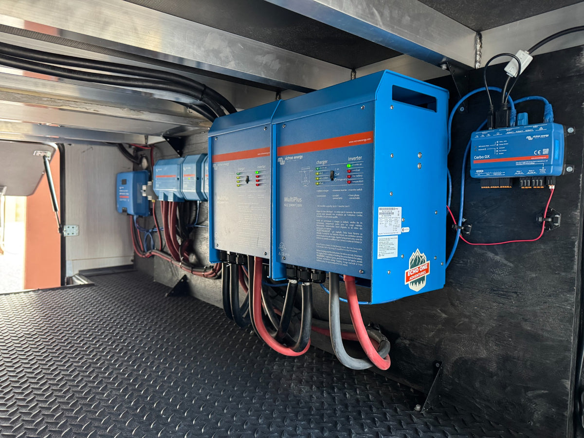 Dual Victron inverter installation in an RV compartment